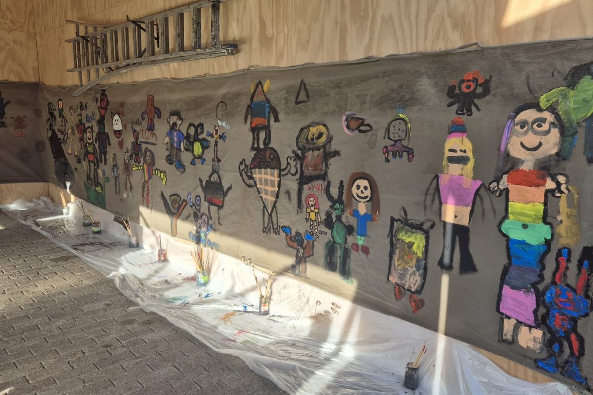Primary school pupils bring windmill sails to life through painting